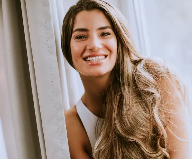 raleigh nc woman smiling model after filler treatment