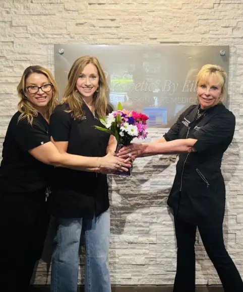 raleigh staff exchanging flowers