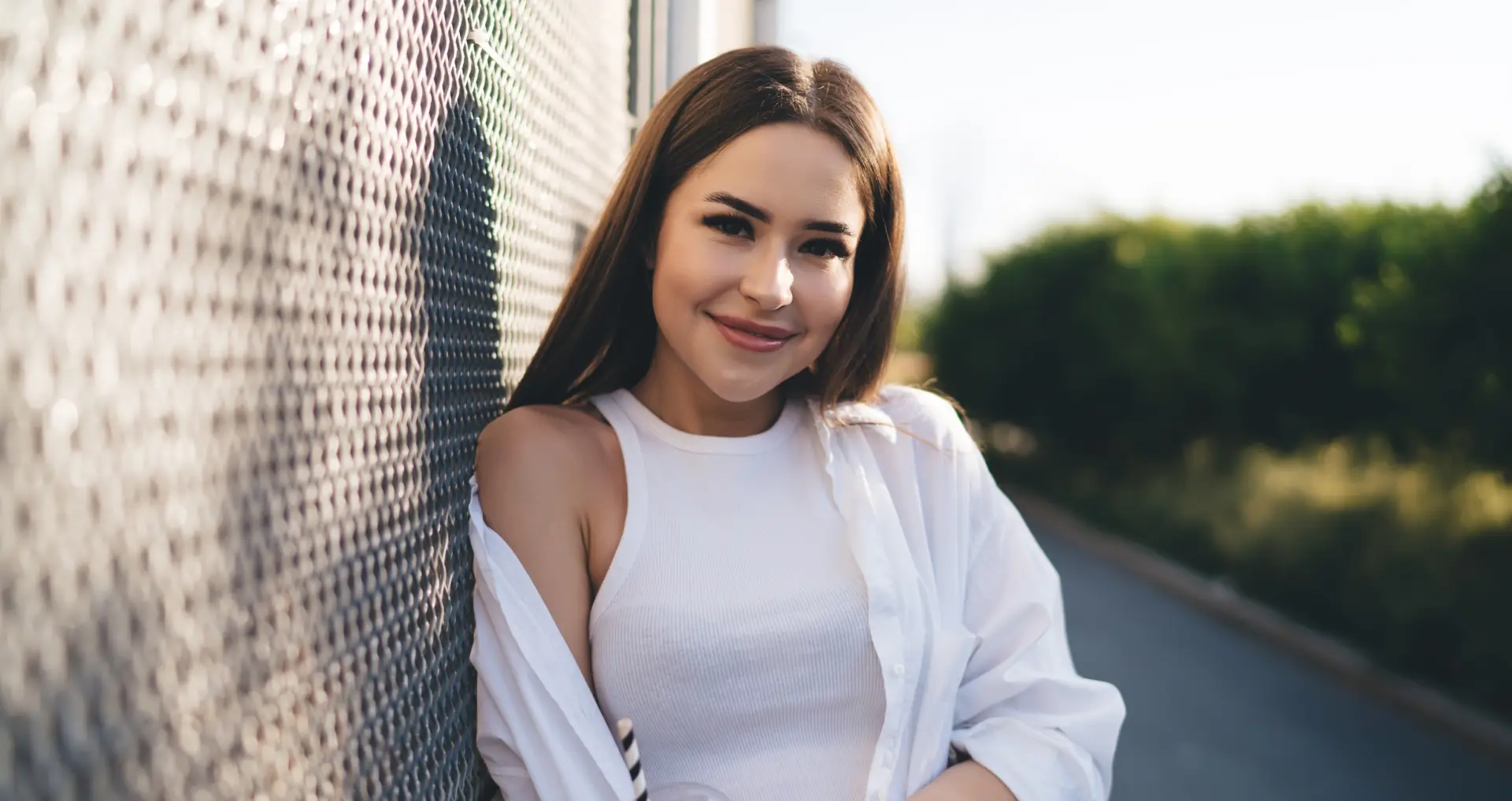 raleigh woman in white tank and open shit